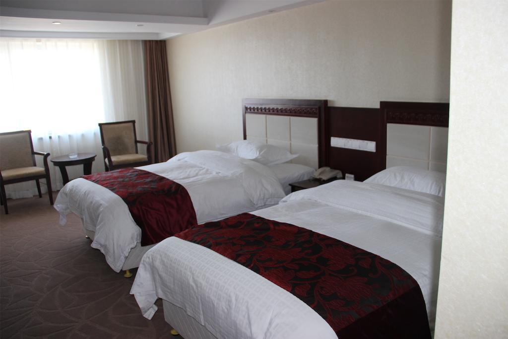 Dalian Southern Airline Pearl Hotel Szoba fotó